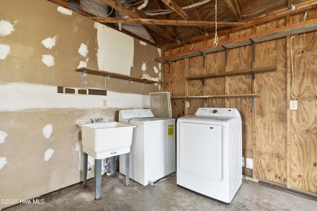 laundry room with laundry area and separate washer and dryer