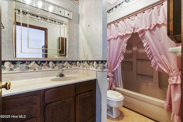 bathroom with shower / tub combo, vanity, toilet, and wallpapered walls