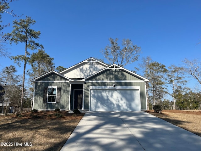 view of front of home featuring driveway and an attached garage