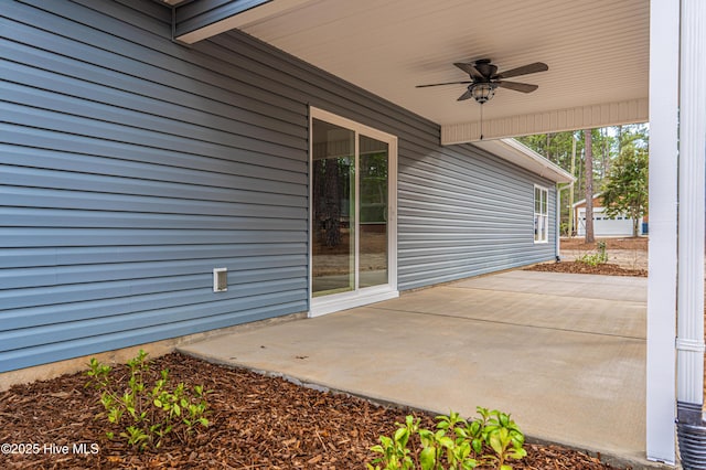 view of patio featuring ceiling fan