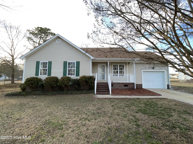 ranch-style home with an attached garage, a front lawn, a porch, and concrete driveway