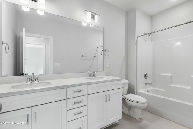 full bathroom with washtub / shower combination, a sink, toilet, and double vanity