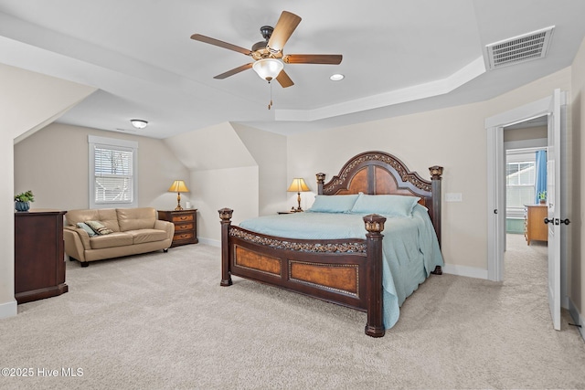 carpeted bedroom featuring lofted ceiling, recessed lighting, a ceiling fan, visible vents, and baseboards