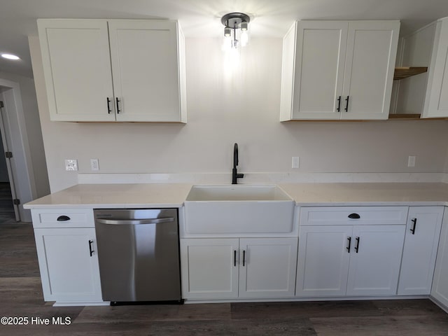 kitchen featuring dark wood-style flooring, open shelves, white cabinetry, a sink, and dishwasher