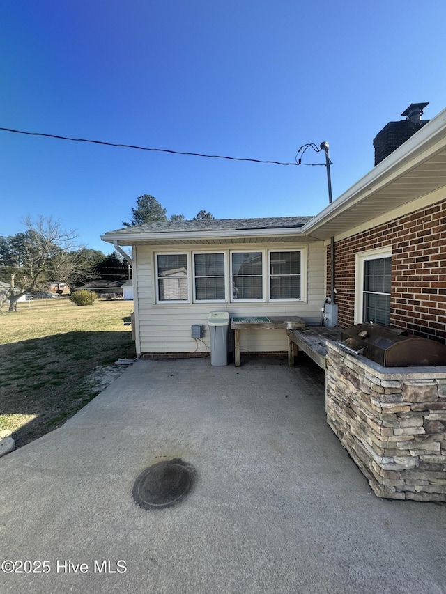 view of patio with exterior kitchen