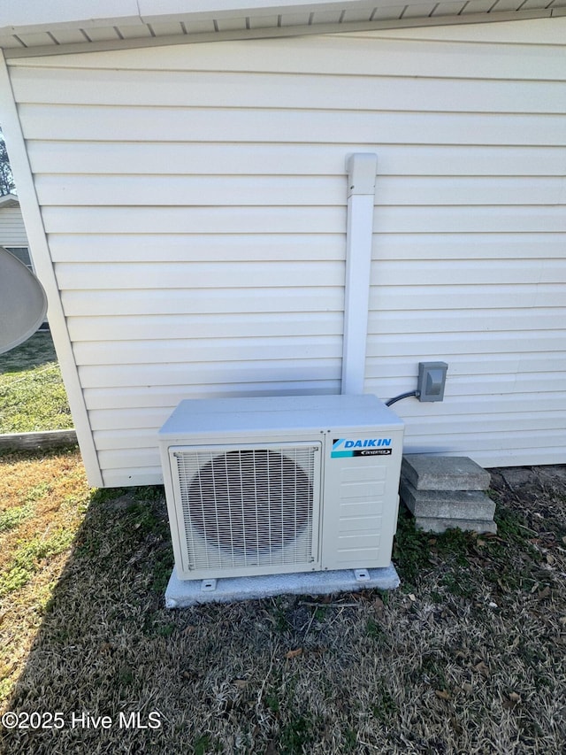 exterior details featuring ac unit