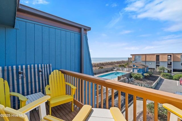 balcony featuring a water view