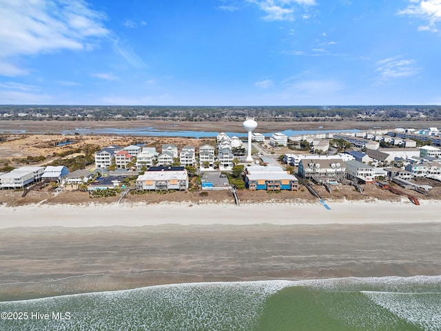 aerial view with a beach view and a water view