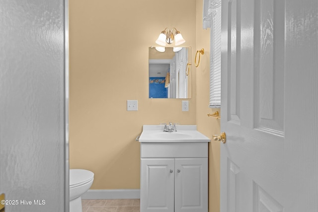 10 Lodge Pole Ln, Pinehurst, NC 28374 - bathroom with vanity, toilet, tile patterned floors, and baseboards