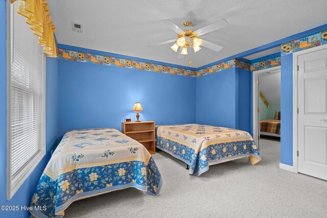 10 Lodge Pole Ln, Pinehurst, NC 28374 - bedroom featuring carpet floors, ceiling fan, a textured ceiling, and baseboards