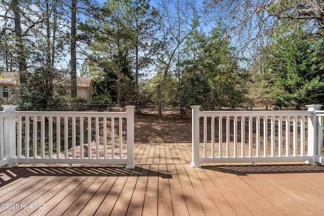 10 Lodge Pole Ln, Pinehurst, NC 28374 - wooden terrace featuring view of scattered trees