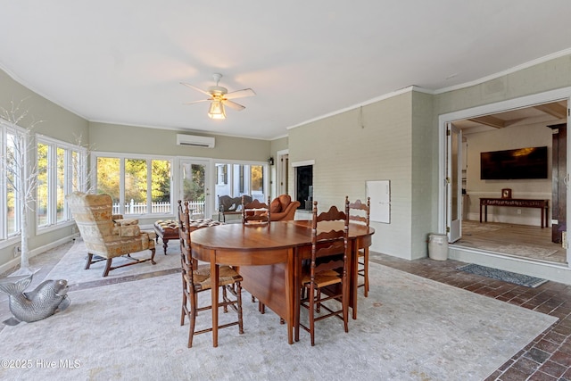 dining area featuring brick floor, ornamental molding, baseboards, and ceiling fan