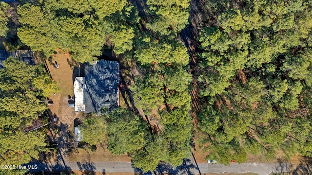 aerial view featuring a view of trees