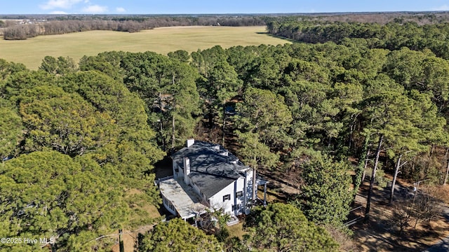 aerial view featuring a view of trees