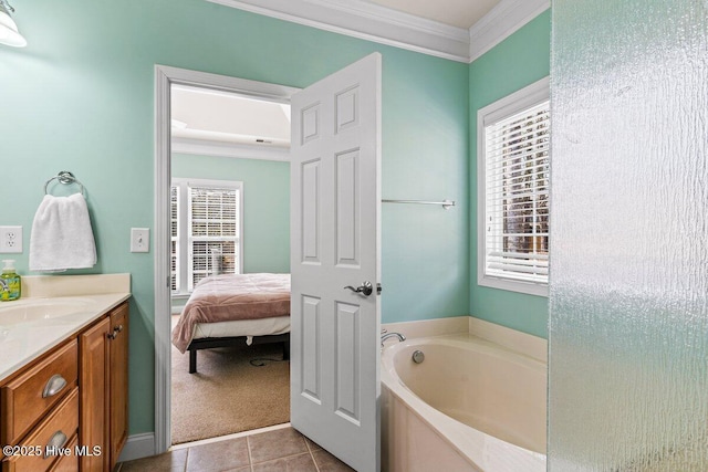 ensuite bathroom featuring connected bathroom, tile patterned flooring, crown molding, vanity, and a bath