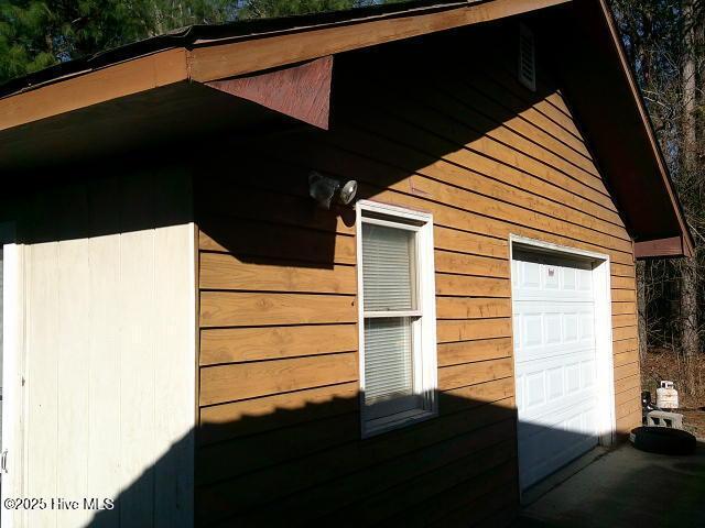 5200 Pineview Rd, Lumberton, NC 28360 - view of property exterior featuring a garage