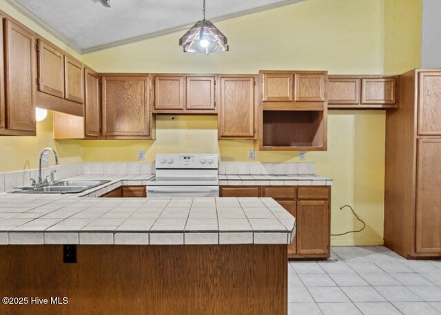 5200 Pineview Rd, Lumberton, NC 28360 - kitchen featuring electric range, a sink, tile countertops, a peninsula, and hanging light fixtures