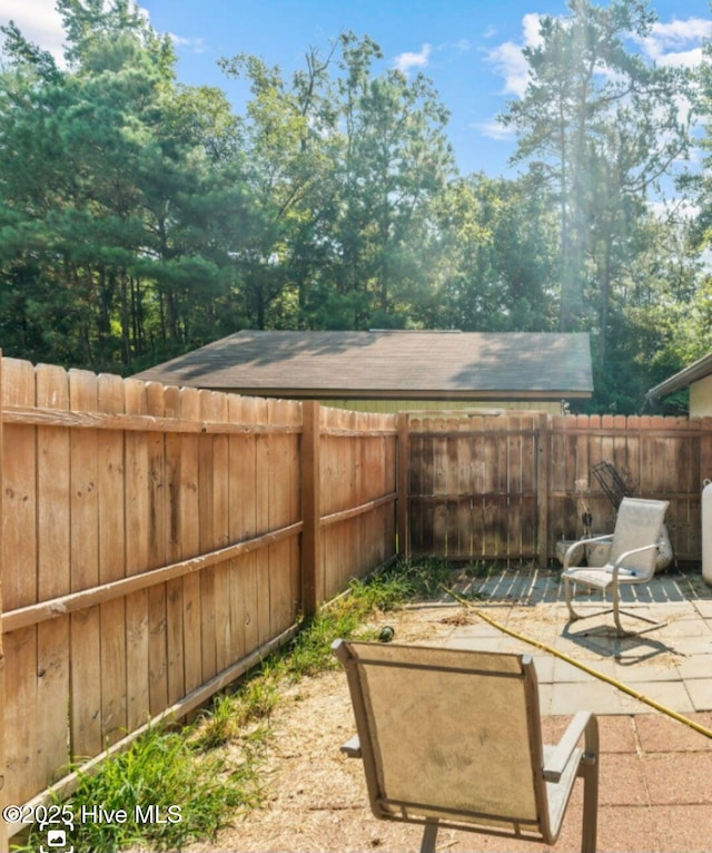 5200 Pineview Rd, Lumberton, NC 28360 - fenced backyard featuring a patio area