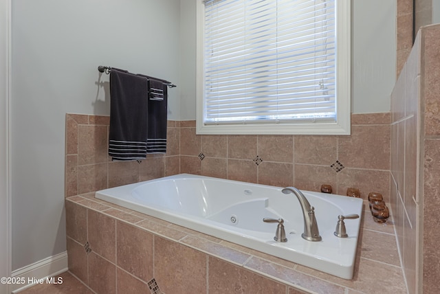 full bathroom featuring a whirlpool tub