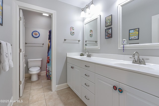 full bath featuring tile patterned flooring, a sink, toilet, and double vanity