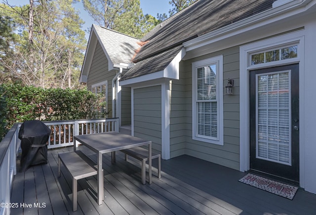 wooden deck with grilling area