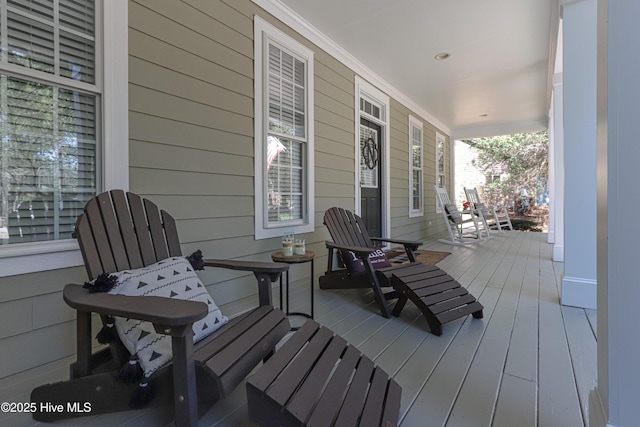 wooden terrace featuring a porch