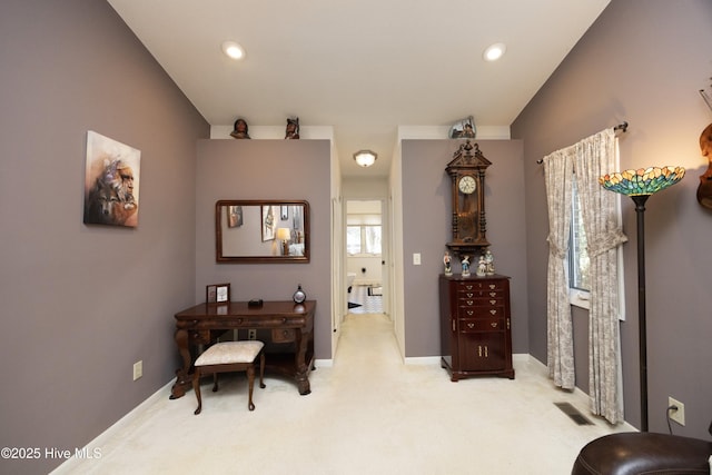 living area featuring carpet, visible vents, baseboards, and recessed lighting