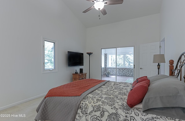 bedroom featuring high vaulted ceiling, ceiling fan, light carpet, and baseboards