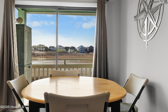 dining room featuring a wealth of natural light