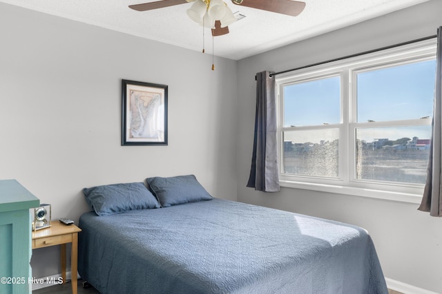 bedroom featuring ceiling fan