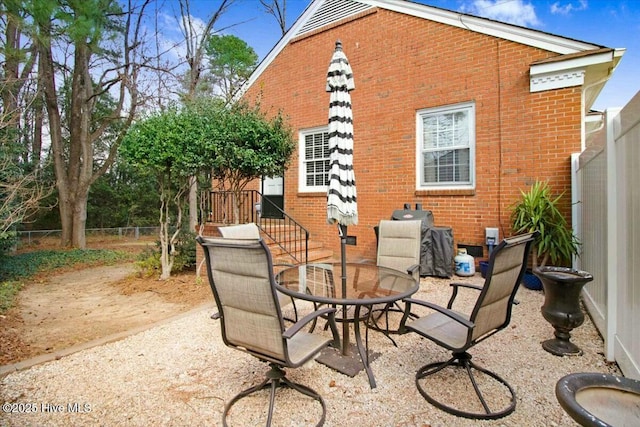 view of patio / terrace with fence