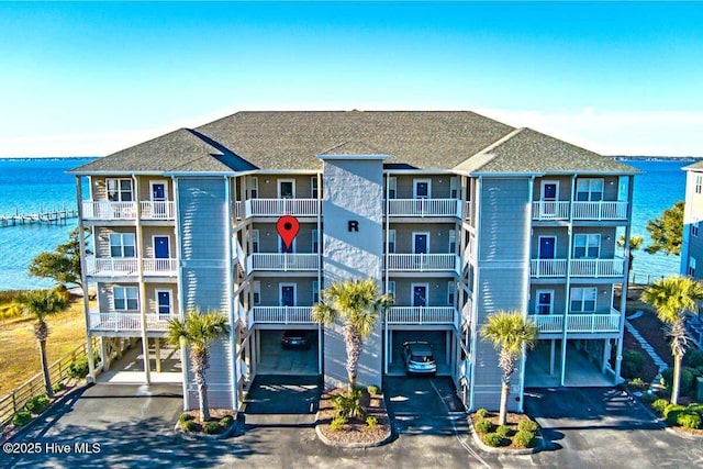 view of building exterior featuring a water view