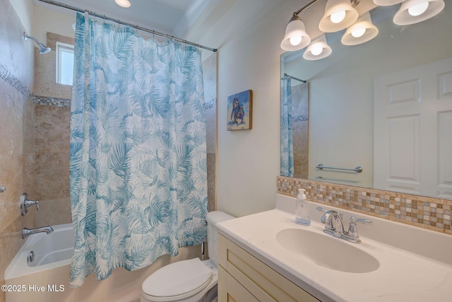 full bathroom featuring toilet, tasteful backsplash, shower / bath combo, and vanity