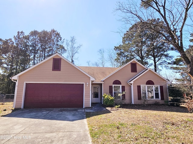 ranch-style house with concrete driveway, a front lawn, and an attached garage