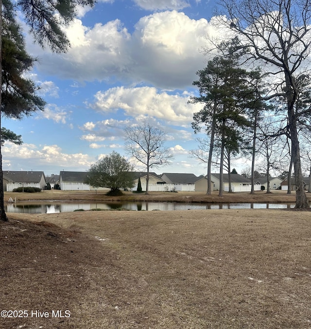 view of yard featuring a water view