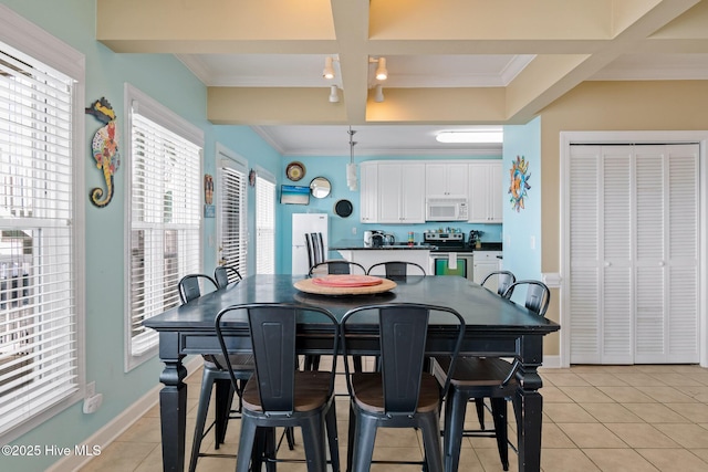 dining room featuring coffered ceiling, crown molding, baseboards, and light tile patterned floors