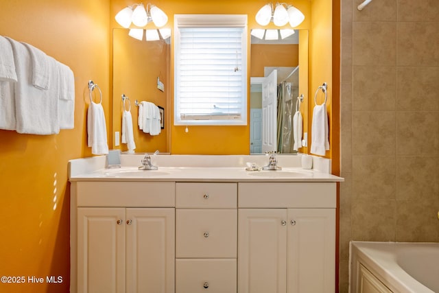 full bathroom with double vanity, walk in shower, a sink, and a tub