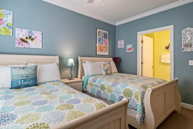 bedroom featuring ensuite bathroom, ceiling fan, baseboards, ornamental molding, and carpet