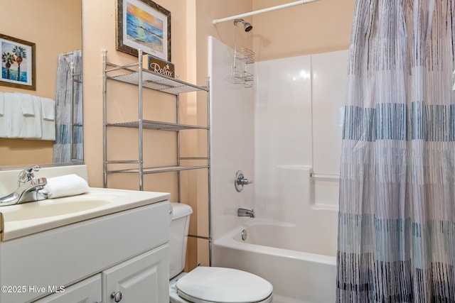 full bathroom featuring toilet, shower / tub combo, and vanity