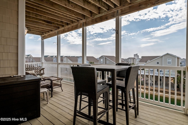 wooden deck featuring a residential view