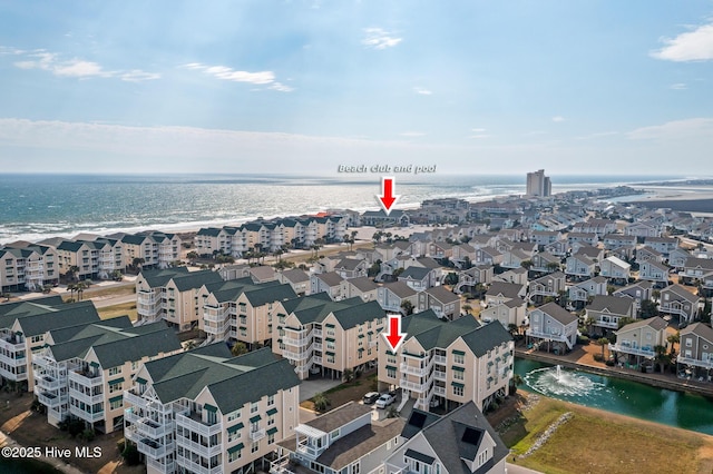 aerial view featuring a water view and a residential view