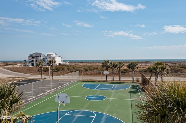 view of basketball court featuring community basketball court and fence