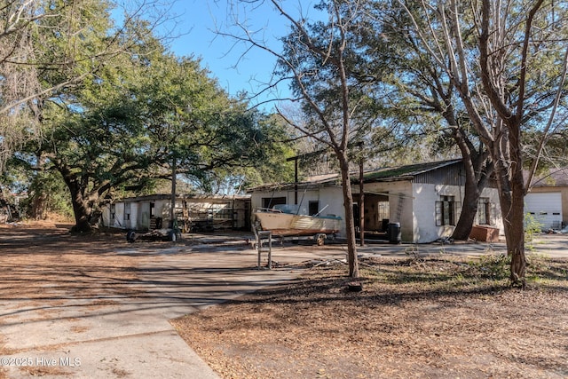 122 Old Fayetteville Rd, Leland, NC 28451 - view of front of home featuring concrete block siding