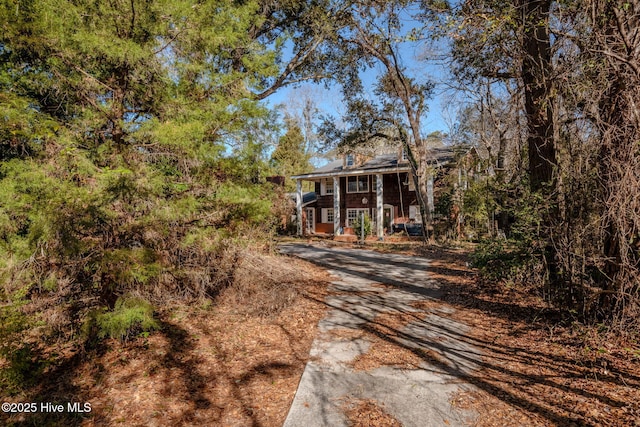 122 Old Fayetteville Rd, Leland, NC 28451 - view of front of house featuring asphalt driveway