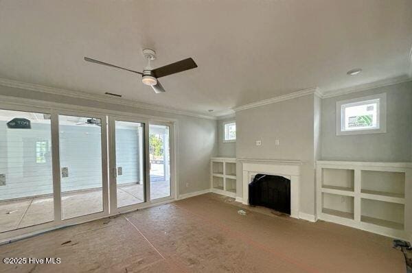 3805 Mason Port Dr Unit 95, Wilmington, NC 28409 - unfurnished living room featuring ceiling fan, healthy amount of natural light, ornamental molding, a fireplace, and baseboards