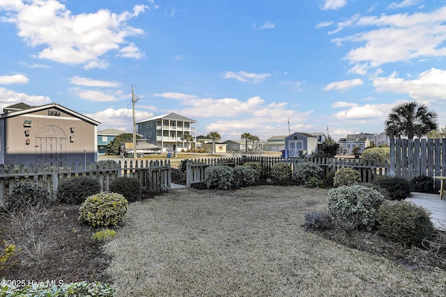 view of yard featuring fence