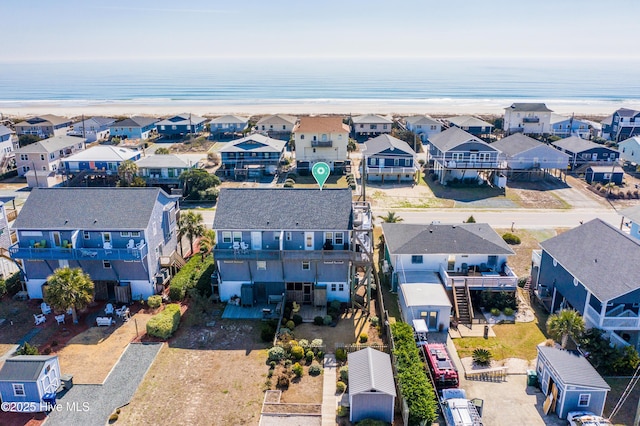 aerial view featuring a water view and a residential view