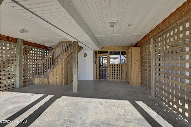 misc room featuring unfinished concrete flooring