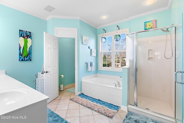 bathroom with a garden tub, baseboards, tile patterned floors, a stall shower, and crown molding