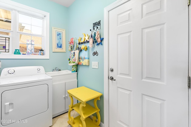 laundry area featuring washer / clothes dryer, a sink, and laundry area